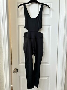 Free People “Back It Up” Black Cutout Onesie